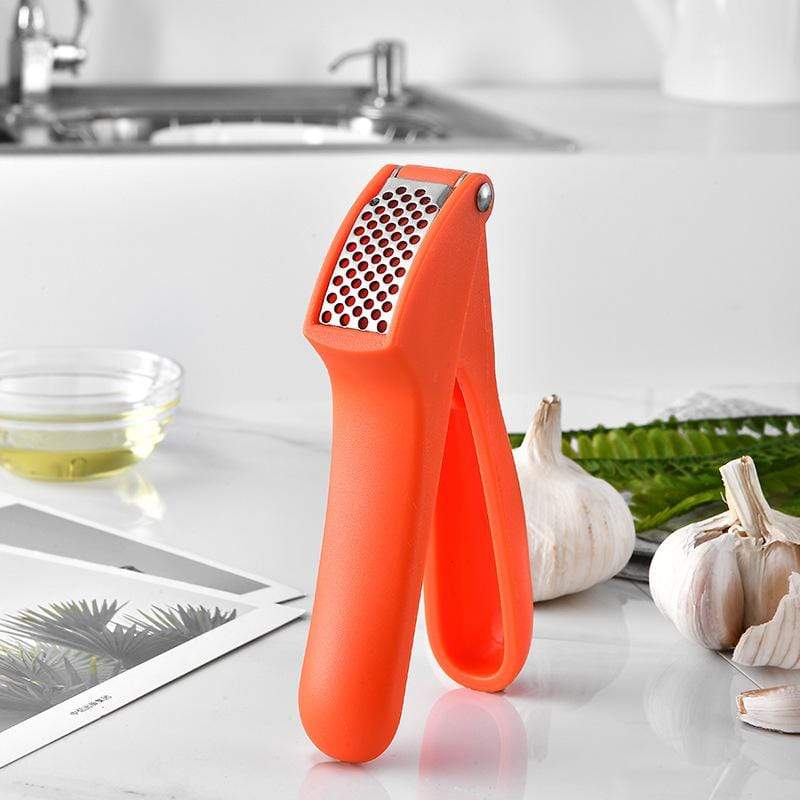Garlic and Ginger Crusher Garlic Press Machine (Buy 1 Get 1 Free) Orange Garlic Press (Buy 1 Get 1 Free)